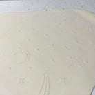 Celestial textured rolling pin pattern embossed in fondant