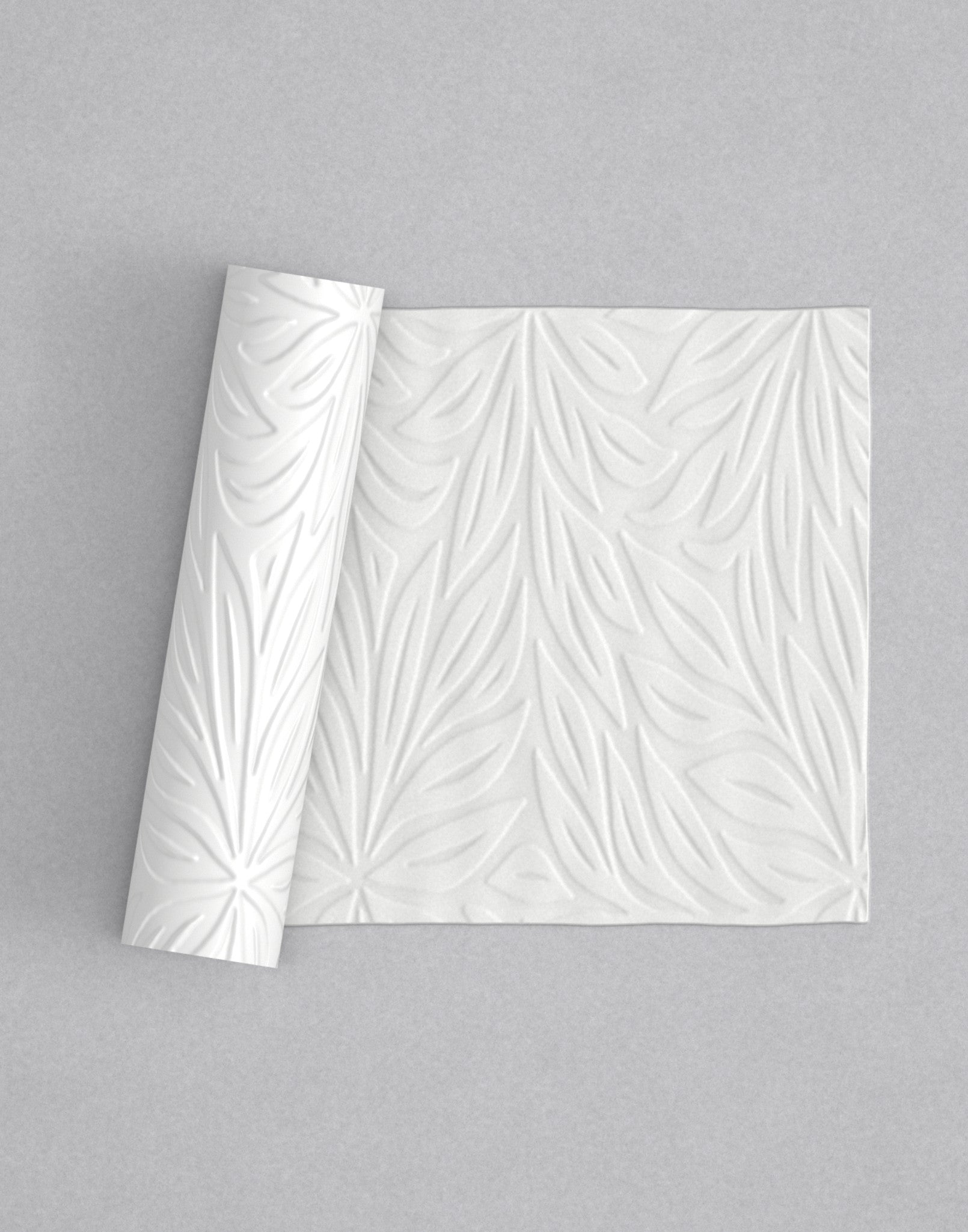 No.20 Full Bloom mini 4" texture rolling pin with its pattern rolled out on white fondant - Prop Options