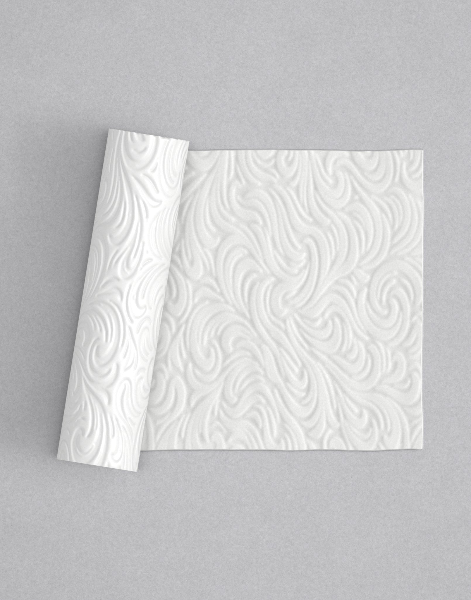 No.40 Rococo mini 4" texture rolling pin with its pattern rolled out on white fondant - Prop Options