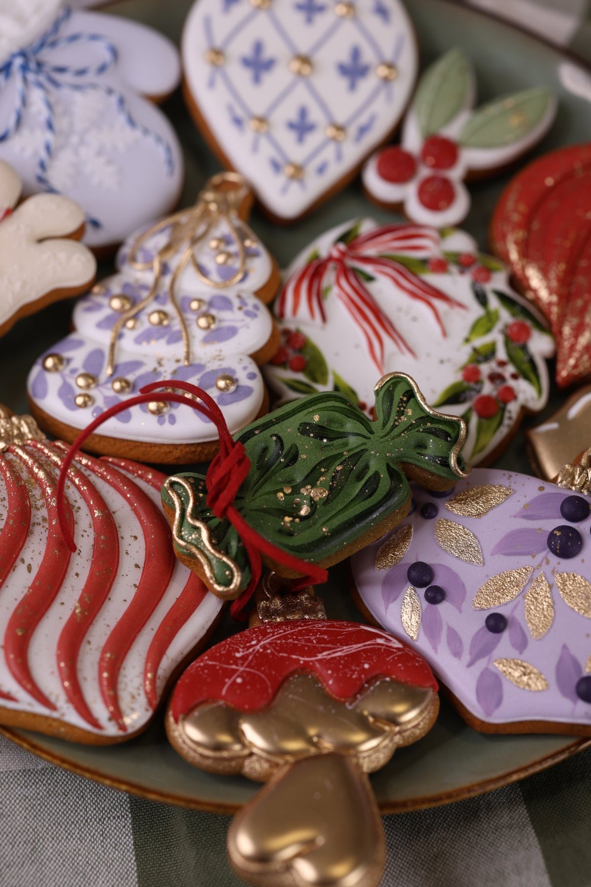 Close-up of decorated bauble, candy and mitten cookies from the Ekat's set